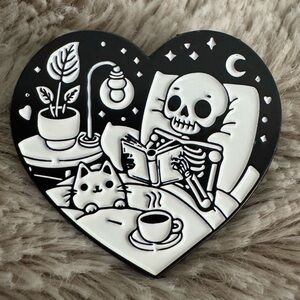 Quirky Skeleton Reading with Cat Heart-Shaped Enamel Pin